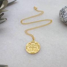 A nice 14k gold-filled necklace with an eye-catching Christian Pendant. A dainty everyday charm that brings good luck and protects the person that is wearing it. A nice gift for her Length approx. 16 inches / 40.5 ♥ All items will be delivered in a nice gift envelope to minimize shipping expenses for you! You may choose gift wrapping at checkout if you wish! If you need it sooner, select expedited shipping at checkout and leave us a note with the wishing date! ★ Read our policies before purchase Luxury Byzantine Engraved Necklace, Brass Byzantine Necklace Perfect For Gifts, Symbolic Gold Plated Coin Necklace, Byzantine Round Pendant Necklace For Gift, Byzantine Style Round Pendant Necklace For Gift, Byzantine Necklace With Coin Pendant As Gift, Byzantine Necklace With Coin Pendant For Gift, Yellow Gold Byzantine Coin Necklace Gift, Yellow Gold Byzantine Necklace For Gift