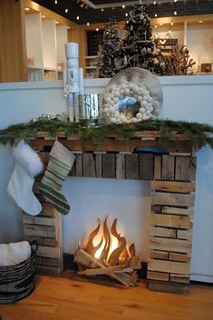 a fire place with christmas decorations on it