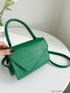 BagForLove - Crocodile Embossed Mini Flap Square Bag Product Description Color Green Type Square Bag Bag Size Mini Strap Type Top Handle Composition 100% Polyurethane Material PU Leather Size Chart INCH CM Strap Length Bag Length Bag Width Bag Height Handle Height 43.3 inch 7.5 inch 2.8 inch 5.1 inch 4.7 inch Strap Length Bag Length Bag Width Bag Height Handle Height 110 cm 19 cm 7 cm 13 cm 12 cm Details Pictures Similar Products h2 { text-align: center; } /* æ¢è¡ */ li{ white-space: normal; w Green Faux Leather Rectangular Bag, Green Rectangular Faux Leather Bag, Trendy Green Crocodile Pattern Bag, Green Double Handle Faux Leather Bag, Green Crocodile Pattern Satchel With Double Handle, Green Crocodile Pattern Tote Bag, Green Crocodile Pattern Shoulder Bag, Green Crocodile Pattern Handheld Bag, Trendy Faux Leather Bag With Crocodile Pattern