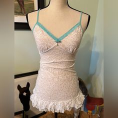 Nwot- Victorias Secret White & Turquoise Sheer Ruffle Lace Nightgown Dress- Size Medium. Adjustable Straps. Sewn On “ Heart Key” And Bow At The Center Of Bust. Stretchy Material In Excellent Unworn Condition. No Snags, Rips Or Stains. Bridal Shower Wedding Night Bachelorette Party Gift Nightie Lingerie Sexy Something Blue Cheeky Coquette Fitted Nightgown With Built-in Bra, Fitted Coquette Nightgown With Built-in Bra, Fitted Camisole With Built-in Bra For Bedtime, White Fitted Sleepwear, Coquette Ruffled Sleepwear For Bedtime, Coquette Ruffled Sleepwear, Lace Trim Nightgown For Sleepover, Feminine Fitted Nightgown With Ruffles, Fitted Lace Trim Nightgown For Sleepover