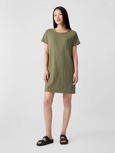 Pocket T-Shirt Dress | Gap Factory Spring Crew Neck Dress With Side Pockets, Casual Crew Neck Dress With Side Pockets, Casual T-shirt Dress For Summer Workwear, Summer Crew Neck Dresses With Side Pockets, Casual Workwear Dress With Curved Hem, Summer Dresses With Crew Neck And Side Pockets, Summer Dresses With Side Pockets And Crew Neck, Casual Crew Neck Dress With Pockets, Casual Fall Dresses With Shirttail Hem