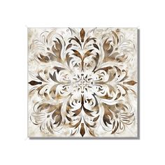 a white and brown tile with an intricate design