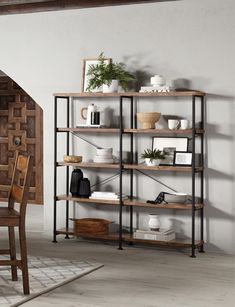 a wooden shelf filled with lots of different types of items on top of each shelf