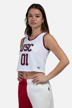 She shoots, she scores! Be the all-star you are in our new Cropped Basketball Jersey! Pair with low rise denim or a mini skirt for a look fit for gameday or everyday. This style features two-color trim and an embroidered twill logo. Have the cutest fit on and off the court! Fit recommendations: True to size, designed to be cropped. Sizing: XS-XXL Embroidered school logo 100% polyester College Gear, University Of South Carolina, School Logo, Cute Fit, Basketball Jersey, Large White, South Carolina, All Star, Basketball