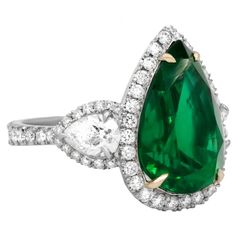 This Gorgeous Ring has 8.78 Carats GIA Certified Pear Shaped Main Stone surrounded by 2 Pear Shaped and multiple small Round Diamonds in 2.00 Carats of total Diamond Weight crafted in Platinum with main stone prongs made of 18K of Yellow Gold. Comes in size 6, but could be re-sized upon your request. Edwardian Engagement Ring, Emerald Ring Vintage, Diamond Rings With Price, Platinum Diamond Rings, Antique Diamond Rings, Emerald Diamond Ring, Vintage Style Rings, Vintage Diamond Rings, Diamond Cocktail Rings