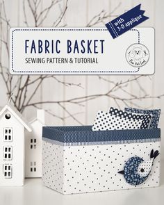 sewing pattern and instructions for fabric basket with bird, house and tree in the background