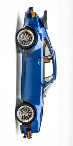 an overhead view of a blue sports car