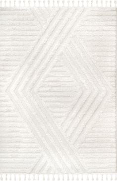 a white rug with fringes on it