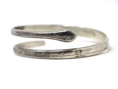 Antique Iraq Iraqi Nielo Silver Snake Bangle Bracelet. Beautiful typical Nielo scenery throughout the bracelet. Signed by artist 'Majid' right under the snake head. Total weight: 50.69 grams  DON'T FORGET TO FAVOURITE OUR SHOP TO STAY UP-TO-DATE ON OUR LATEST ESTATE CLEARANCES & FINDINGS. OFFERS ACCEPTED ON SELECTED ITEMS ONLY. SEND ME AN OFFER WITH YOUR LOCATION AND I'LL GET BACK TO YOU ASAP Iraq, Arm Band, Handmade Silver, Bangle Bracelets, Silver Bracelet, Jewelry Bracelets, Bangles, Etsy Uk, Silver