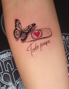 a tattoo with a butterfly on it and the words to do papo written in cursive writing