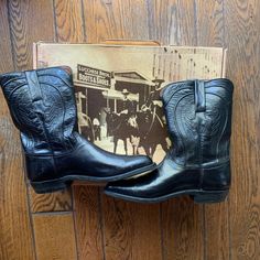 1980's Original Lucchese Soft Leather Boots In Black. Handcrafted. Worn Once - Perfect Condition (Can't Wear Because Of Knee Injury). Very Rare To Find 30 Year Old Boots In Such Perfect, New Condition. Black With Embossing Pattern On Side. Comes With Box. Vintage Boots With Leather Sole And Square Toe, Vintage Black Boots With Reinforced Heel, Vintage Black Plain Toe Boots, Retro Black Pointed Toe Boots, Retro Black Leather Boots, Vintage Black Pointed Toe Boots, Vintage Black Boots Medium Width, Vintage Boots With Leather Lining And Medium Width, Vintage Black Boots With Square Toe