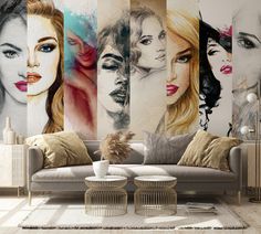 a living room filled with furniture and paintings on the wall