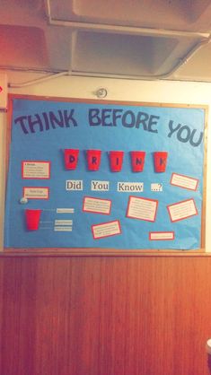 a bulletin board that says think before you run did you know? with red cups on it