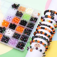 the beads are arranged in different shapes and sizes, along with an assortment of them