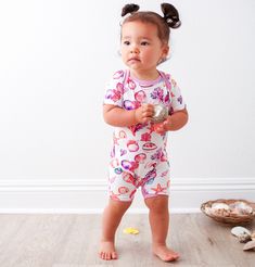 Our amazingly soft shortalls are the perfect one piece outfit to keep your babe feeling cool and comfy. These soft as butter shortalls are perfect for spring and summertime lounging. Lap shoulder design and snaps on legs makes for easy breezy changing. Made with super soft bamboo. 93% bamboo and 7% spandex Wash cold with like colors; stays soft wash after wash Playful Short Sleeve Onesie, Short Sleeve Onesie For Summer Loungewear, Summer Short Sleeve Bodysuit For Loungewear, Summer White Onesie For Bedtime, White Summer Onesie For Bedtime, Fun Short Sleeve Onesie For Playtime, Cute Short Sleeve Jumpsuits And Rompers For Playtime, White Summer Bedtime Onesie, Playful Summer Onesie For Bedtime