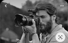 a man taking a photo with his camera