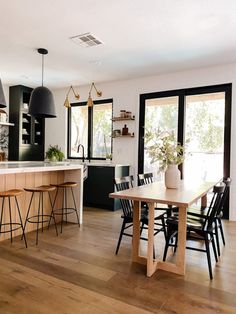 the kitchen is clean and ready to be used as a dining room or living room