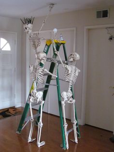 there is a ladder that has skeletons on it