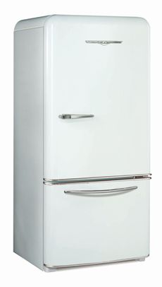 a white refrigerator freezer sitting on top of a counter