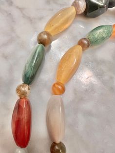 Vintage Agate, Carnelian, Jade, Jasper, Bloodstone, mixed beaded, hand-knotted necklace, in many sizes and shapes with spherical spacer stones; approx 42" long. This is an unusual and rare, handmade necklace. CONDITION: minor wear and use consistent with age and use. Please see the photos for condition. We can send you more photos if you need them. Will send within 24-48 hours Multicolor Large Beads Agate Necklace, Multicolor Agate Large Beaded Necklaces, Multicolor Agate Beaded Necklace With Large Beads, Multicolor Carnelian Necklaces With Polished Beads, Multicolor Agate Necklaces With Large Beads, Multicolor Carnelian Beaded Necklace With Large Beads, Multicolor Agate Beaded Necklaces With Oval Beads, Multicolor Carnelian Beaded Necklaces With Large Beads, Multicolor Carnelian Gemstone Beaded Necklaces