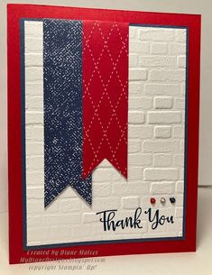 a thank you card with red, white and blue ribbon