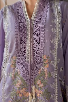 Lilac Chikankar Kameez Salwar Pakistani Party Wear comes in and Embroidered Center Panel, Side Panels, Embroidered Sleeves, Embroidered Sleeves Border, Lace Neckline, Lace Patches for Slits, and Lace Borders. It is paired with Embroidered Net Dupatta, Embroidered Dupatta Length Border, Embroidered Dupatta Pallu Border, it has Plain Dyed Back, paired with Plain Dyed Trouser Detailed Description: SKU: PN221 Detailing: Embroidery, Threads, Floral designs Color: Lilac Fabric: Lawn Design: Fully Embr Center Lace Kurti Design, Pakistani Lace Kurtas, Kameez Design, Lilac Fabric, Stitching Designs, Pakistani Boutique, Sobia Nazir, Code Design, Eid Dress