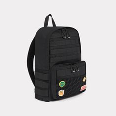 This vintage-style backpack features a number of the brand's iconic motifs. The wide self-adhesive band is adorned with a KENZO monogram and carries four movable badges offering a fun look. One of them in particular presents the KENZO Paris logo. The many pockets included in this backpack make organising your daily essentials easy.
'KENZO Jungle' rucksack.Self-adhesive monogrammed band.Detachable badges, one featuring the KENZO Paris logo.Monogrammed jacquard lining.Adjustable straps.Handle on t Designer Rectangular Bag With Logo Patch, Designer Rectangular Bags With Logo Patch, Back To School Standard Backpack With Logo Patch, Designer Bags With Logo Patch For Everyday Use, Daily Use Backpack With Logo Patch, Rectangular Travel Backpack With Logo, Rectangular Logo Backpack For Travel, Retro Black Rectangular Backpack, Standard School Backpack With Logo Patch