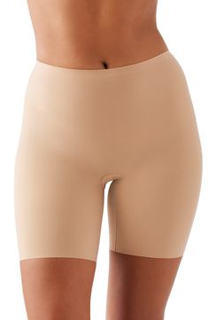 Get a sleek silhouette under outfits in these lightweight, superstretchy shaping shorts that offer allover, medium-level control and a line-free finish. 60% elastane, 40% polyamide Hand wash, dry flat Imported Compression Shapewear With Built-in Shorts, Shapewear Bottoms With Built-in Shorts, Fitted Smoothing Mid-thigh Shorts, Fitted Shapewear With Built-in Shorts, Shaping Bottoms With Built-in Shorts In Short Length, Shaping Bottoms With Built-in Shorts, Shaping Smoothing Short Bottoms, Fitted Elastane Shapewear In Short Length, Compression Smoothing Shorts