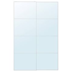 a white wall with four squares in the middle and one square at the bottom, on top