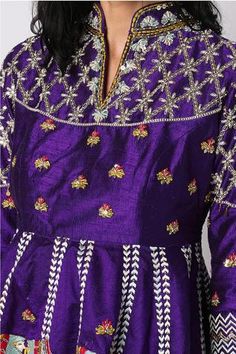 Purple peplum top with hand-embroidered floral motifs with scalloped hem. Paired with lehenga with camel motifs embroidery
Component: 2
Pattern: Embroidered
Type Of Work: Camel Motifs
Neckline: Mandarin Collar
Sleeve Type: Three Quarter
Fabric: Silk
Color: Purple
Other Details: 
Scalloped hem top
Asymmetric top
Occasion: Destination Wedding - Aza Fashions Anarkali Embroidered Top For Navratri With Intricate Embroidery, Anarkali Embroidered Top With Dori Work, Diwali Floral Embroidered Anarkali Top, Festive Anarkali Embroidered Top With Intricate Embroidery, Purple Floral Embroidered Dress With Traditional Drape, Purple Dress With Floral Embroidery In Traditional Drape, Purple Dress With Floral Embroidery And Traditional Drape, Purple Anarkali Set With Embroidered Border, Festival Blouse With Embroidered Border For Reception