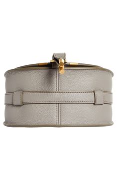 Curvaceous detailing and gleaming hardware ornament the saddle-shaped flap of a crossbody bag crafted from sumptuous grained leather in a compact silhouette. Front flap closure Adjustable crossbody strap Exterior slip pocket beneath flap Interior card slot Textile lining Leather Made in Italy or Spain Designer Handbags This brand has B Corp certification, representing business practices with emphasis on social and environmental performance, accountability and transparency This brand meets Nordst Luxury Saddle Shoulder Bag With Brass Hardware, Luxury Saddle Bag With Brass Hardware, Luxury Flap Bag With Brass Hardware And Top Handle, Luxury Saddle Bag With Brass Hardware And Top Handle, Elegant Leather Saddle Bag With Silver-tone Hardware, Luxury Leather Saddle Bag With Brass Hardware For Evening, Luxury Saddle Bag With Brass Hardware Crossbody, Elegant Formal Saddle Bag With Brass Hardware, Luxury Crossbody Saddle Bag With Silver-tone Hardware