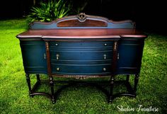 an old dresser is painted blue and brown