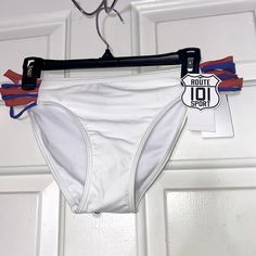 This Route 101 Sport Bikini Bottom Is Brand New With The Original Tag And With The Protective Panty Liner Still Inside.Size Lg Feel Free To Bundle With Matching Items White Stretch Bottoms For Pool, White Stretch Swimming Bottoms, White Stretch Swimwear For Sports, Stretch White Swimwear For Sports, Sporty White Swimwear For Beach Season, White Brief Bottoms For Poolside, White Stretch Brief Swimwear, Sporty Fitted White Swimwear, White Fitted Sporty Swimwear