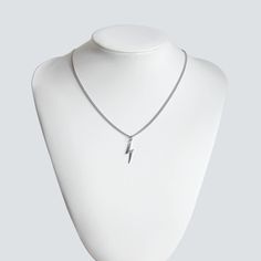 A classic, masculine, and subtle stainless steel lightning bolt necklace that will not tarnish or rust over time, even when worn in the water. 💎Free shipping on all orders💎Waterproof and non-tarnish💎Packaging that is ready to offer as a gift💎Customizable and adjustable chain length A lightning bolt necklace, a great gift for athletes, Harry Potter fans and more This lightning bolt pendant necklace is one of our best-selling necklaces. It is especially popular among athletes because it is a s Lightning Necklace, Lightning Bolt Necklace, Trendy Chic, Necklace For Men, Lightning Bolt, Ladies Boutique, Chain Pendants, Men Necklace, Chain Lengths