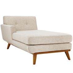 a beige chaise lounge chair with wooden legs