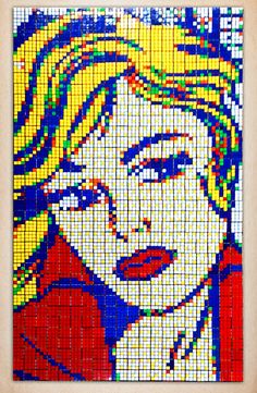 an image of marilyn monroe made out of legos and colored bricks on the wall