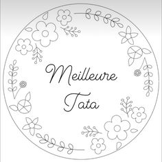 a plate with flowers and the words mellieure tata on it