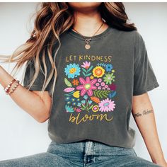 Spread kindness wherever you go with our Let Kindness Bloom T-Shirt! Featuring a beautiful floral and abstract design, this shirt is a reminder to always let kindness bloom in your heart and actions. Comfortable and stylish, it's the perfect addition to your wardrobe. Comfort Colors Tshirt, Spread Kindness, Blue Jean, Tshirt Colors, Comfort Colors, Abstract Design, Blue Jeans, Colorful Shirts, Womens Tops