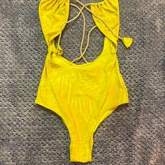 Rare And Vintage H&M Monokini. From 10 Years Ago. Sold Out Everywhere. Rope Fixtures And Tie Clothes. Stretchy Material. Good Hardware. Size 4. Modeled On Myself. It’s Clearly Too Small For Me! Lol Never Worn But No Tags Yellow One-piece Swimwear For Pool, Yellow Backless Swimwear For Sunbathing, Yellow Backless Swimwear For Spring, Yellow Stretch Swimwear For Beachwear, Neon Yellow Swimwear For Spring Beach Outing, Yellow Backless Swimwear For Poolside, Neon Yellow Swimwear For Spring Beach, Yellow Sleeveless Swimwear For Beach Season, Yellow Backless Swimwear For Party