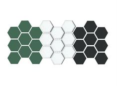 three hexagonal tiles with green and white colors on them, one in the middle