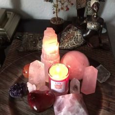 candles, rocks and crystals on a table