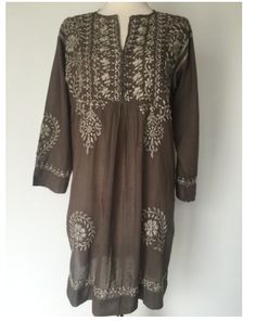 Tan and beige hand embroidered cotton tunic dress for your Bohemian soul. 100% cotton button front hand wash handmade in India MEASUREMENT CHART Fall Bohemian Embroidered Cotton Dress, Bohemian Long Sleeve Embroidered Cotton Dress, Traditional Brown Embroidered Dress, Brown Embroidered Cotton Dresses, Traditional Long Brown Kurta, Brown Long Sleeve Traditional Dress, Traditional Brown Cotton Kurta, Spring Bohemian Straight Kurta Embroidered Dress, Spring Bohemian Embroidered Straight Kurta Dress