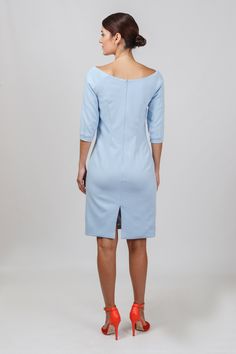 "An elegant sheath dress featuring boat neckline, midi length, and fitted silhouette. - boat neckline - wiggle pencil silhouette - knee length (midi) - 3/4 sleeves with cuffs - back slit - fully lined Concealed back zipper closure Fiber: 60% viscose, 35% polyamid, 5% elastane Lining: 57% viscose, 35% polyamid, 8% elastane Color: Light blue (white lining) For size S: length- 39,76\" (101 cm) Our model wears size S (US 8) and is 171cm/5'6\" tall. Perfect as cocktail dress, Bridesmaid dress, mother Boat Neck Dresses, Midi Wedding Guest Dress, Boat Neck Dress, Bride Groom Dress, Cheongsam Dress, Dress Bridesmaid, Wiggle Dress, Knee Dress, Groom Dress