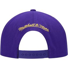 Step out in groundbreaking style with this Los Angeles Lakers Earthquake hat. This Mitchell & Ness headwear features throwback team graphics shattering through the bold design. With a snapback closure for a perfect fit, this cap will give any Los Angeles Lakers outfit an earthmoving finish.Step out in groundbreaking style with this Los Angeles Lakers Earthquake hat. This Mitchell & Ness headwear features throwback team graphics shattering through the bold design. With a snapback closure for a pe Throwback Sports Trucker Snapback Hat, Throwback Snapback Trucker Hat For Sports, Throwback Sports Snapback Trucker Hat, Throwback Hats For Sports Events, Throwback Snapback Hat With Curved Brim For Sports, Throwback Snapback Hat For Sports Events, Throwback Snapback Trucker Hat For Sports Events, Collegiate Snapback Hat With Curved Visor For Streetwear, Collegiate Snapback Hat With Curved Visor