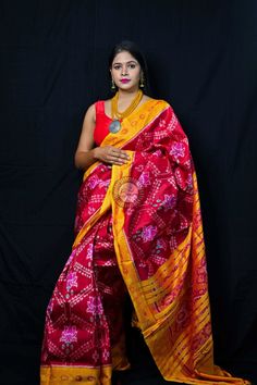 Weaver communities of Maniabandha and Nuapatana of Odisha traditionally weave this kind of saree. Common motifs are star, temple, conch, rudraksh, fish, chakra, lotus etc. The inspiration of all its designs comes from nature. It is the best of single ikat; one of warp and weft is tied and dyed prior to weaving. The borders and the pallas have tremendous variety and each one of them is attractive and praiseworthy. Specification:  Occasion: Festive Wear Fabric: Khandua Silk Primary Color: Maroon Secondary Color: Yellow Material : Khandua Silk Pattern: Motif Border Type: Ikat Border Size: Medium Blouse Piece: Not Included Care: Dry Clean Disclaimer : This is a genuine handwoven piece, & that could expect unevenness in the selvedge and weave, and colours may fade or bleed due to the traditiona Multicolor Motif Pre-draped Saree For Puja, Multicolor Pre-draped Saree With Motifs For Puja, Multicolor Pre-draped Bandhani Saree For Transitional Season, Transitional Multicolor Pre-draped Saree With Bandhani Print, Chanderi Pre-draped Saree With Motifs For Puja, Multicolor Pre-draped Saree With Motifs For Traditional Ceremonies, Traditional Wear With Motifs For Puja During Navratri, Festive Handloom Pre-draped Saree For Puja, Traditional Handloom Pre-draped Saree For Diwali