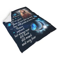 a blanket with the words and images of two women on it, in front of a night sky