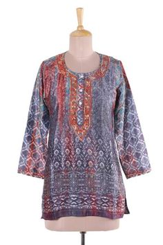 Designed by Shalabh this fashionable tunic from India features intricate printed patterns in tones of grey burnt sienna and buff. Beautiful floral motifs are embroidered by hand along this tunic's button-up neckline. Bohemian Multicolor Blouse For Eid, Bohemian Eid Tunic With Printed Motifs, Bohemian Blouse With Printed Motifs For Eid, Bohemian Tunic With Printed Motifs For Festive Occasions, Long Sleeve Paisley Print Kurta For Festive Occasions, Festive Long Sleeve Kurta With Paisley Print, Festive Long Sleeve Paisley Print Kurta, Bohemian Multicolor Tunic With Printed Motifs, Bohemian Multicolor Printed Tunic