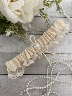 Ivory Lace Bridal Garter Set Beautiful garter in ivory lace and a pearl accent Sale is final, but 100% satisfaction guaranteed. Please contact us if there are any issues with your purchase. Elegant Cream Lace For Wedding, Elegant Cream Lace For Bride, Fitted Cream Wedding Dress, Elegant Beige Lace For Wedding, Adjustable Lace Bridal Accessories For Wedding, Cream Lace Wedding Dress For Ceremony, Fitted Cream Lace For Ceremony, Cream Fitted Lace For Ceremonies, Adjustable Cream Bridal Accessories For Ceremony