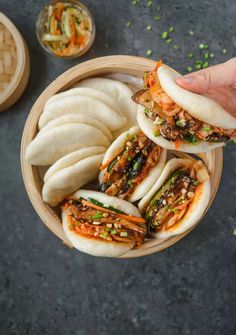 an overhead view of some food in a bowl with chopsticks on the side