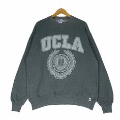 PLEASE ASK ANY QUESTION BEFORE BUYING THIS IS USED CLOTHING PLEASE DONT EXPECTED IT TO BE LIKE NEW OR IN PRISTINE CONDITION Vintage 90s UCLA University Sweatshirt California Big Logo Spell Out Sweater Size XLarge tag Russell material cotton 50% polyester 50% saiz on tag XL (XLarge) Mesasures About ( Approximately) -Armpit to Ampit : 24 inch -Length (back collar down) : 28 inch Condition : used good condition 8/10 **No Tears No Stains And No Hole** 🎈PLEASE READ THE DESCRIPTION AND POLICY BEFORE Ucla University, College Sweater, College Gear, University Sweatshirts, Fashion Logo, Streetwear Outfit, Used Clothing, Cute Shirts, Long Sweatshirt